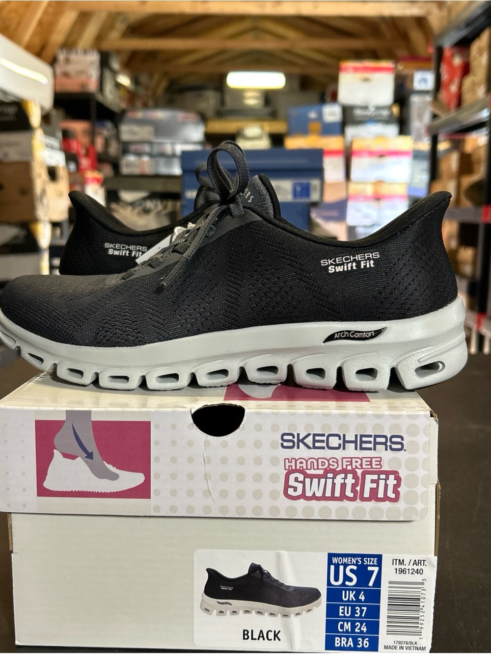 Skechers Swift Fit Women’s Black and White Slip-On Sneakers